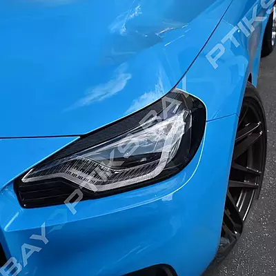 Dry Carbon Fiber Headlight Eyelid Eyebrow Trim – Fits BMW G87 M2 (2023–2025) Dry Carbon Fiber Headlight Eyelid Eyebrow Trim – Fits BMW G87 M2 (2023–2025)