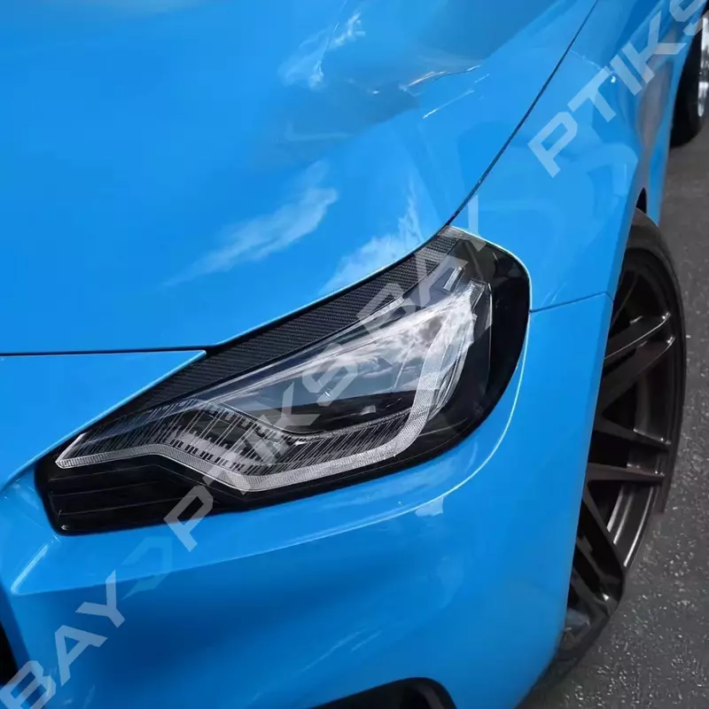 Dry Carbon Fiber Headlight Eyelid Eyebrow Trim – Fits BMW G87 M2 (2023–2025) Dry Carbon Fiber Headlight Eyelid Eyebrow Trim – Fits BMW G87 M2 (2023–2025)