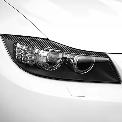 Carbon Fiber Headlight Eyebrows for BMW E90/E91 3 Series (2006–2012) Carbon Fiber Headlight Eyebrows for BMW E90/E91 3 Series (2006–2012)