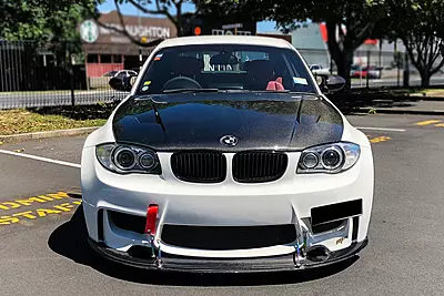 BMW 1 Series E82 E88 1M RZ Style Carbon Fiber Hood (2008–2013) BMW 1 Series E82 E88 1M RZ Style Carbon Fiber Hood (2008–2013)